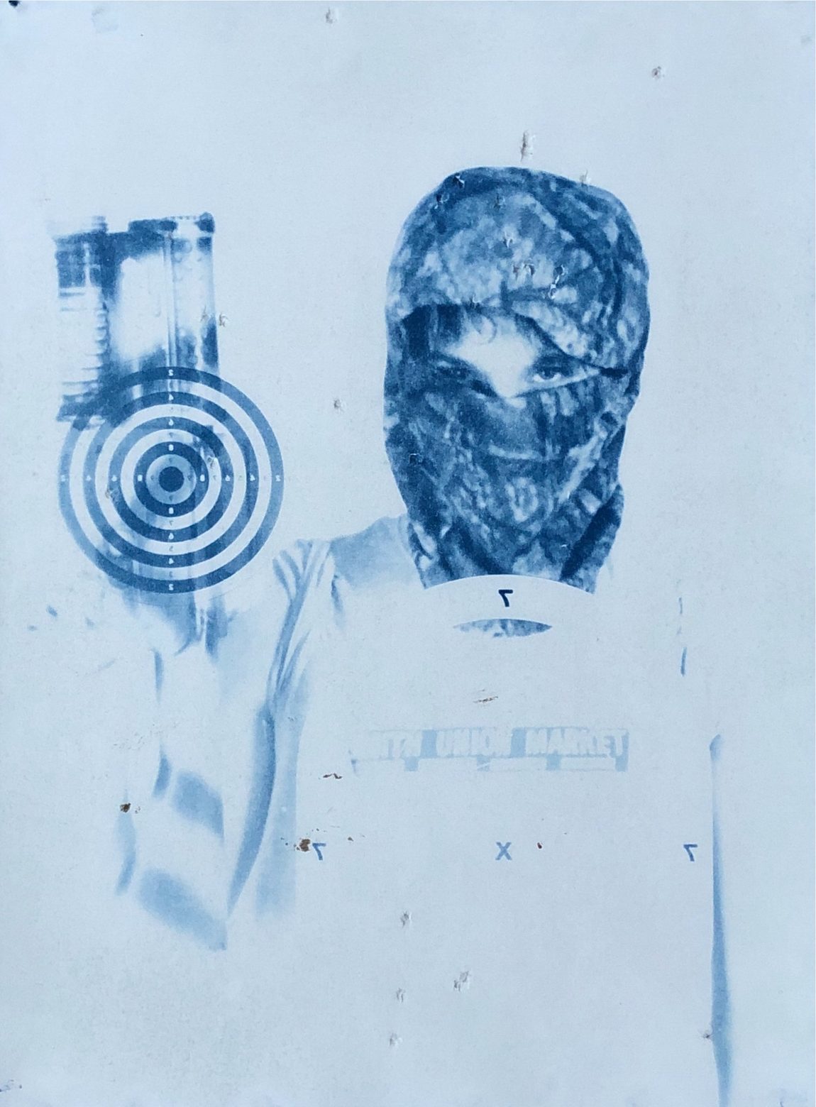 Cyanotype: face centred on a scorekeeper target