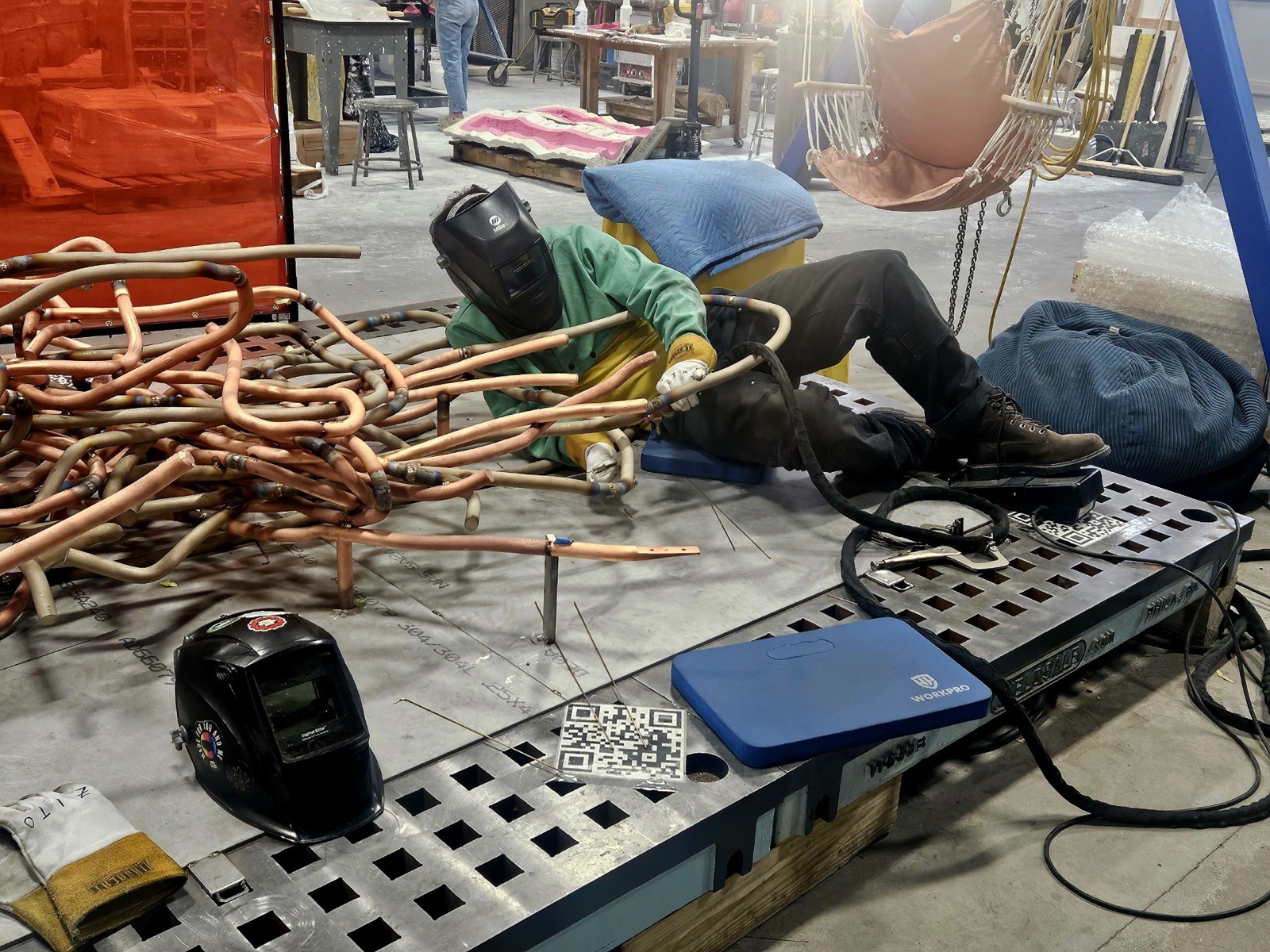 Steel components laid out on the shop floor